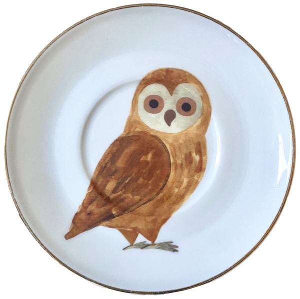 Uil op schotel met gouden rand