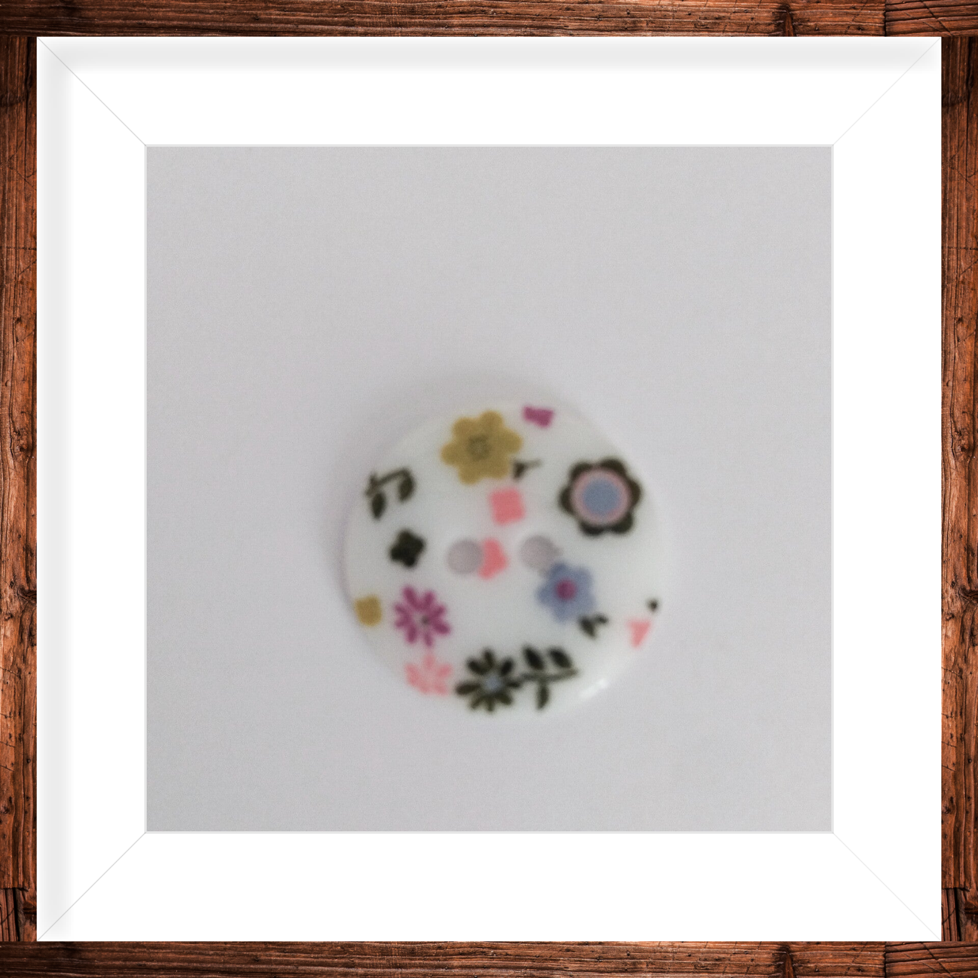 Bouton rond deux trous a fleurs