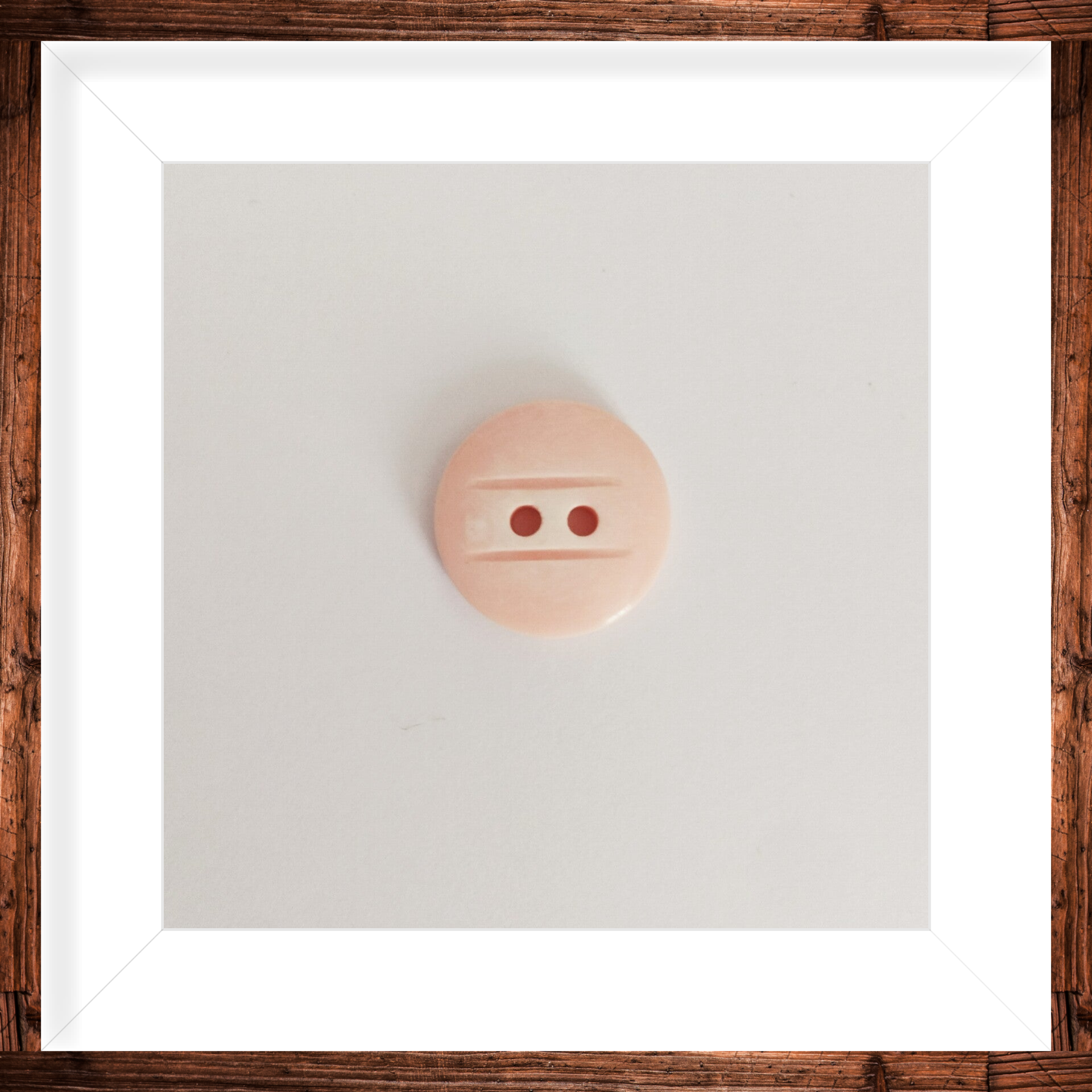 Bouton rond 15mm deux trous - au choix