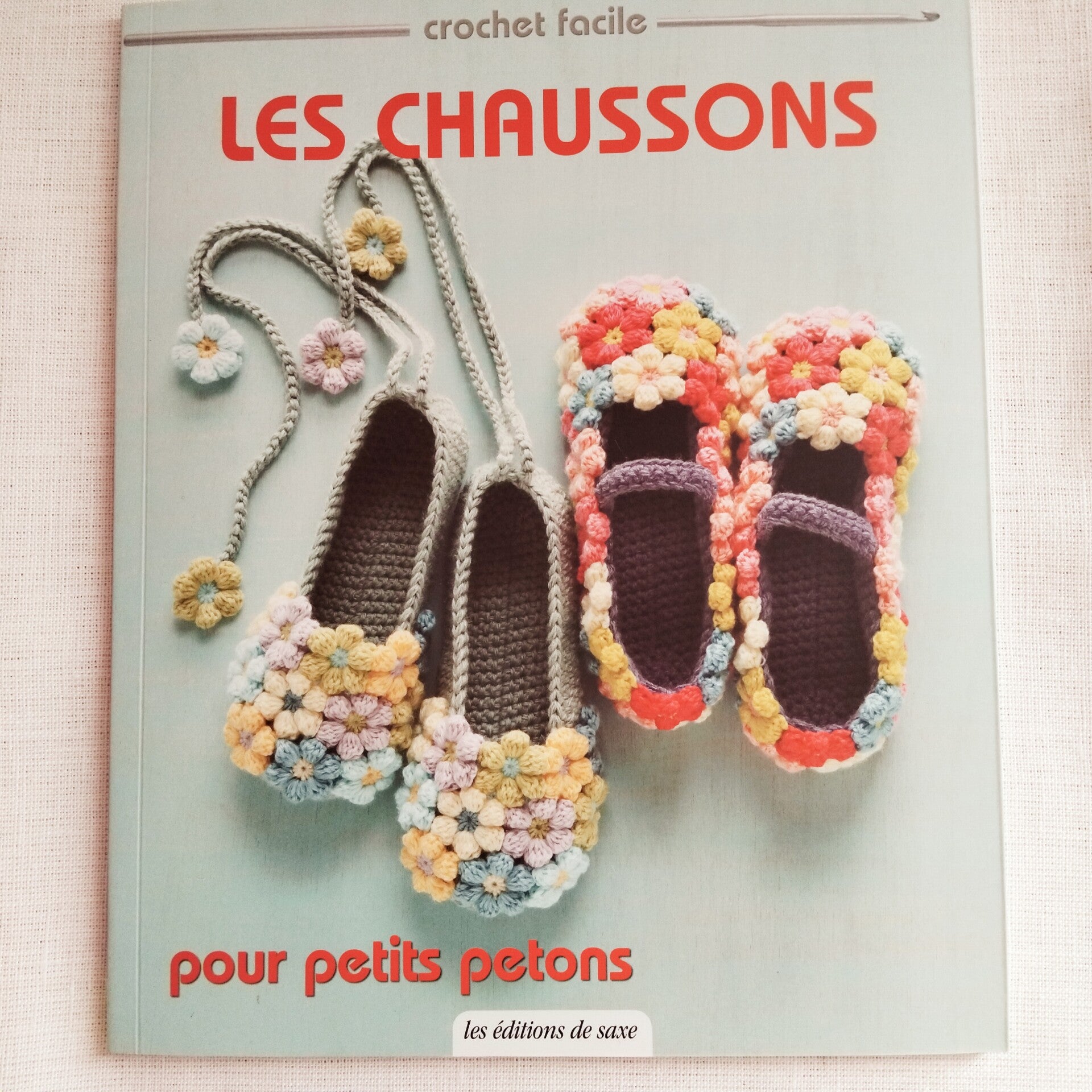 Livre Les chaussons pour petits petons