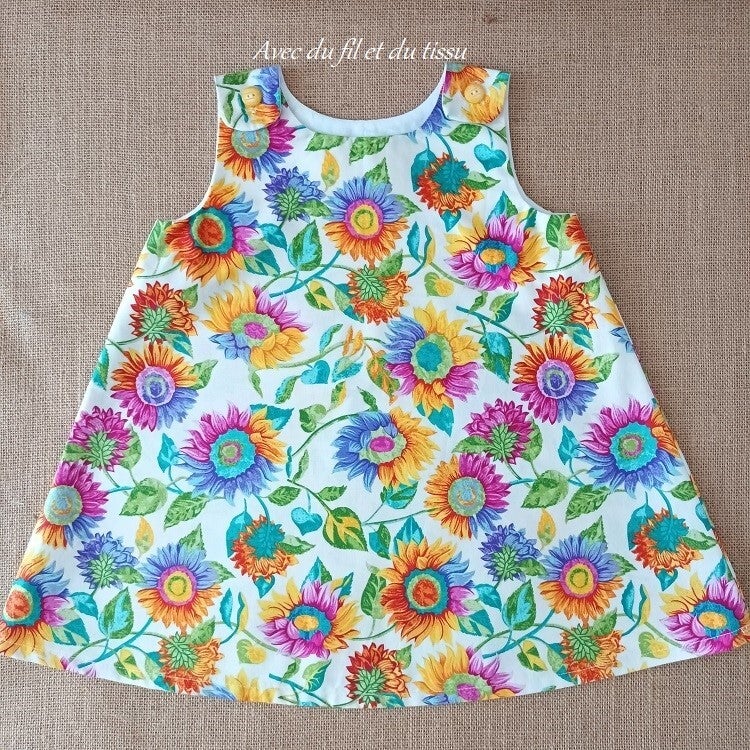 Robe enfant motifs dahlias boutonnee epaule