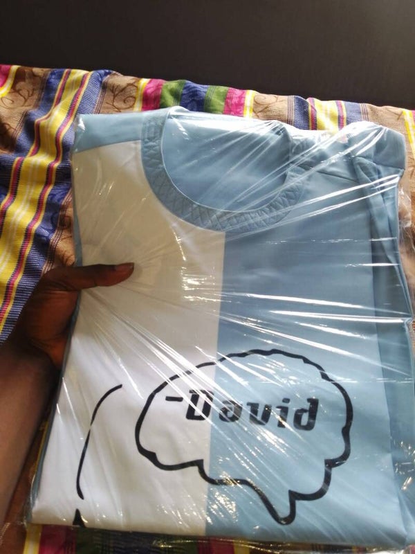 Blue and White Pants Suit with Name by Elijah O.