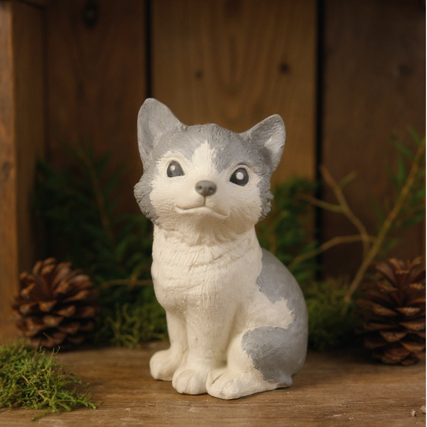 Petit loup assis