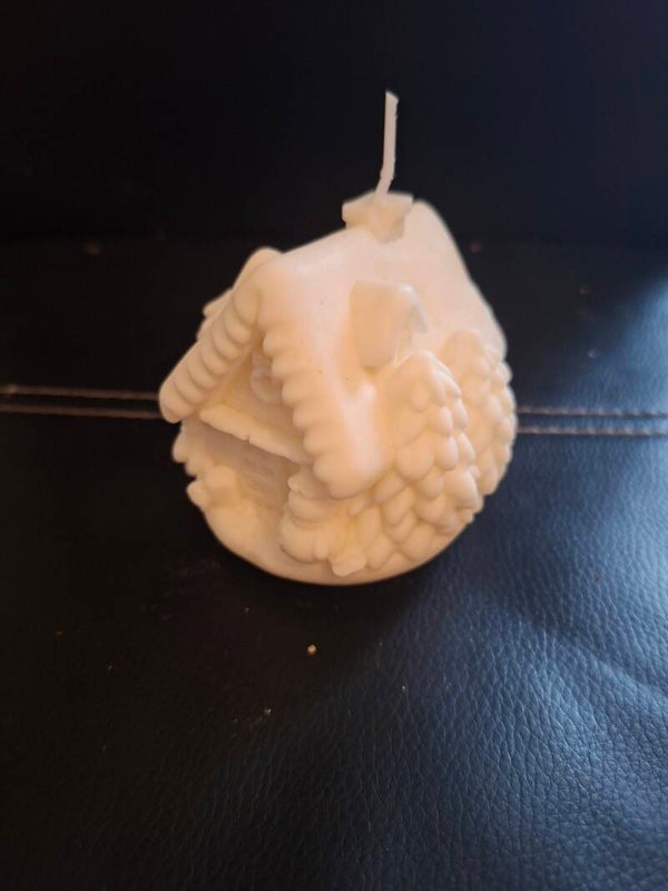 Weihnachtshaus Kerze