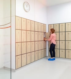 Clean modern locker room with contemporary keyless lockers