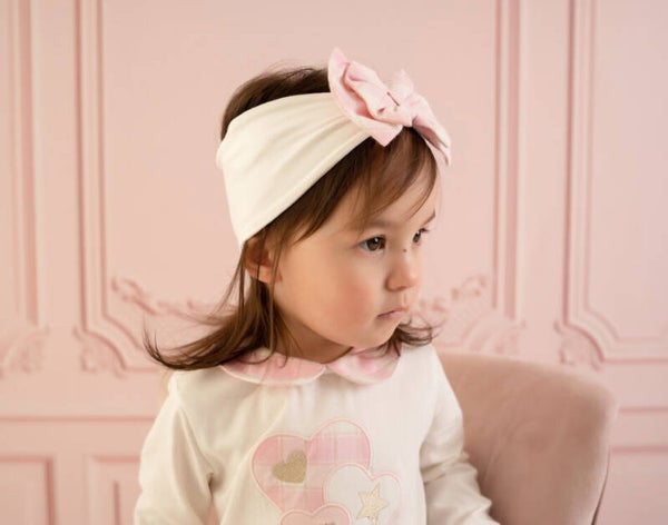 Check me out witte haarband met strik met roze details