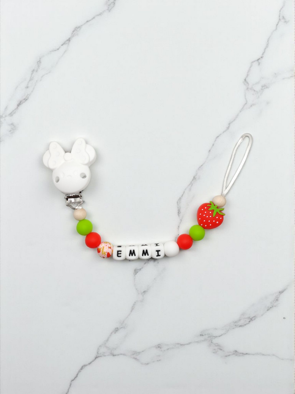 Tuttinauha, vaunulelu ja pururengas mansikka