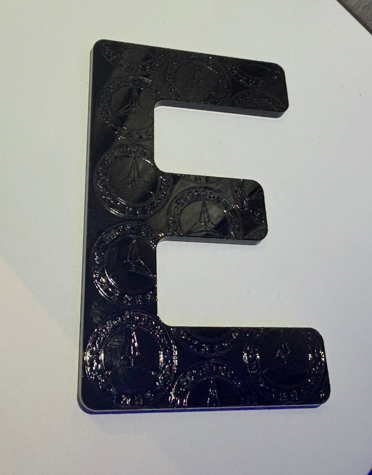 Mercedes engraved numbers and letters