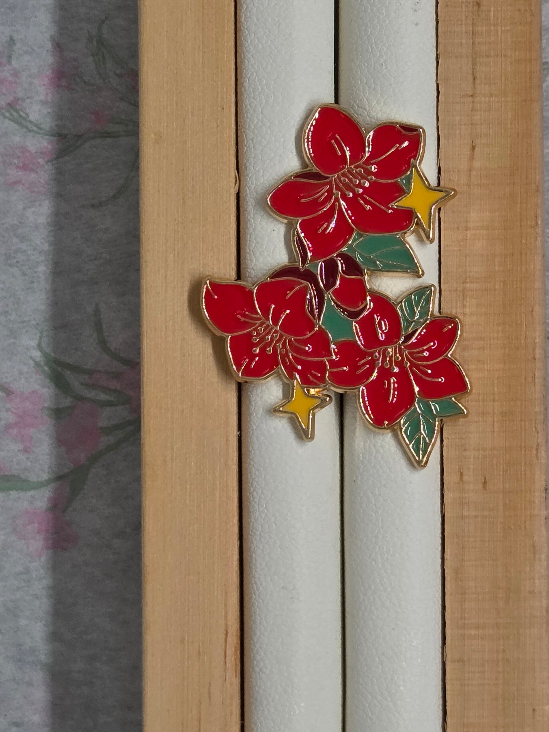 Pin's fleur étoilée