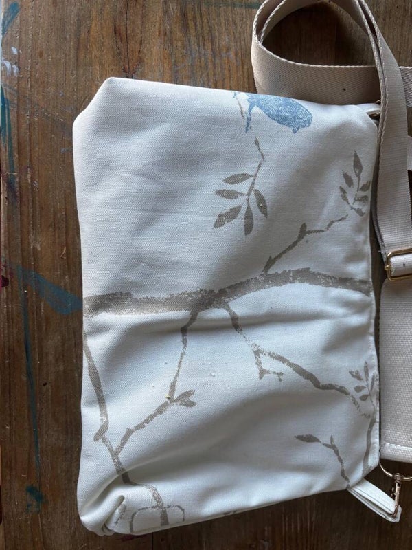 Cream patterned zip handbag