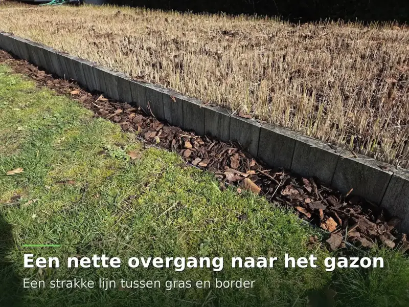 Strook boomschors als nette overgang tussen gazon en border