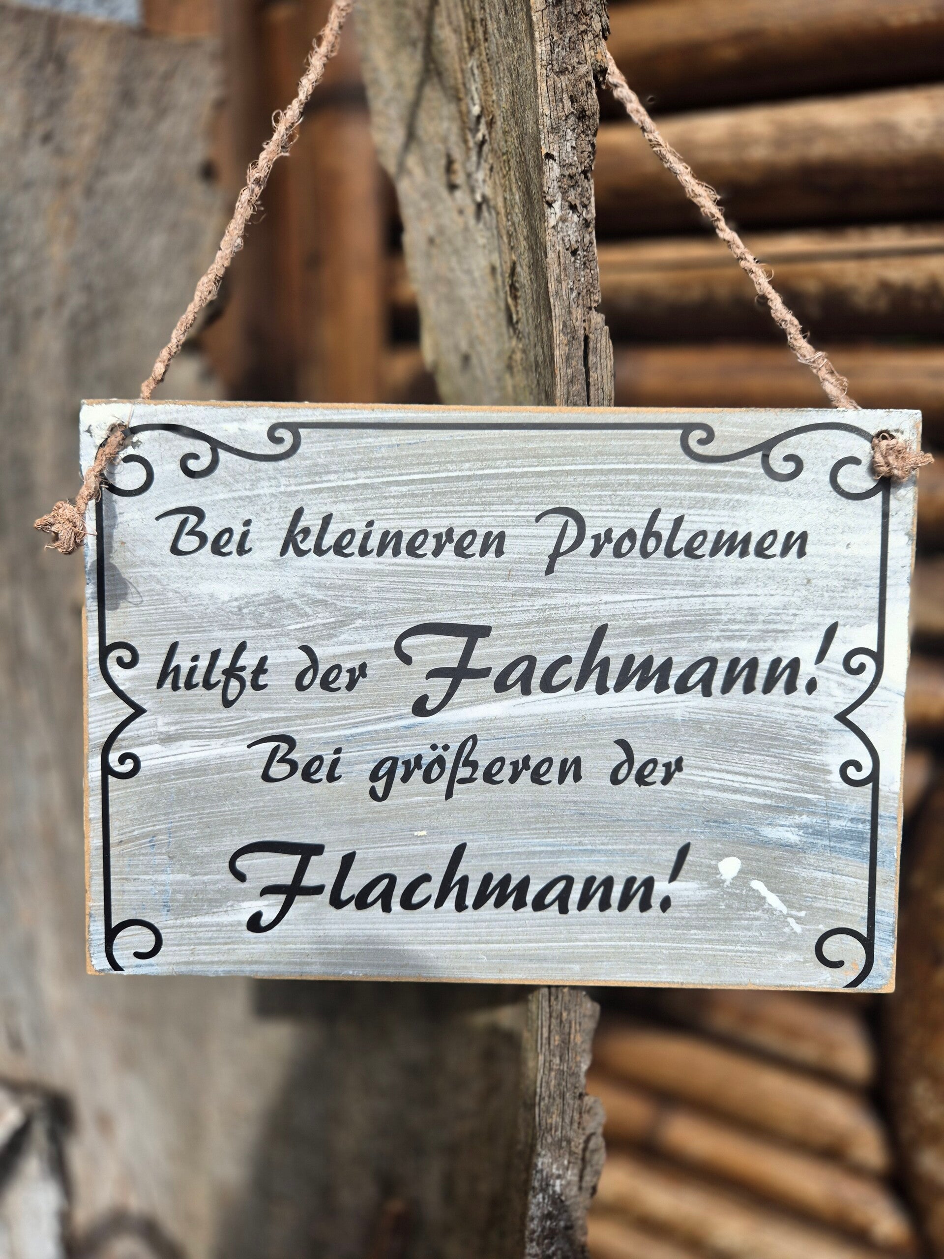 Holzschild Spruch. Fachmann