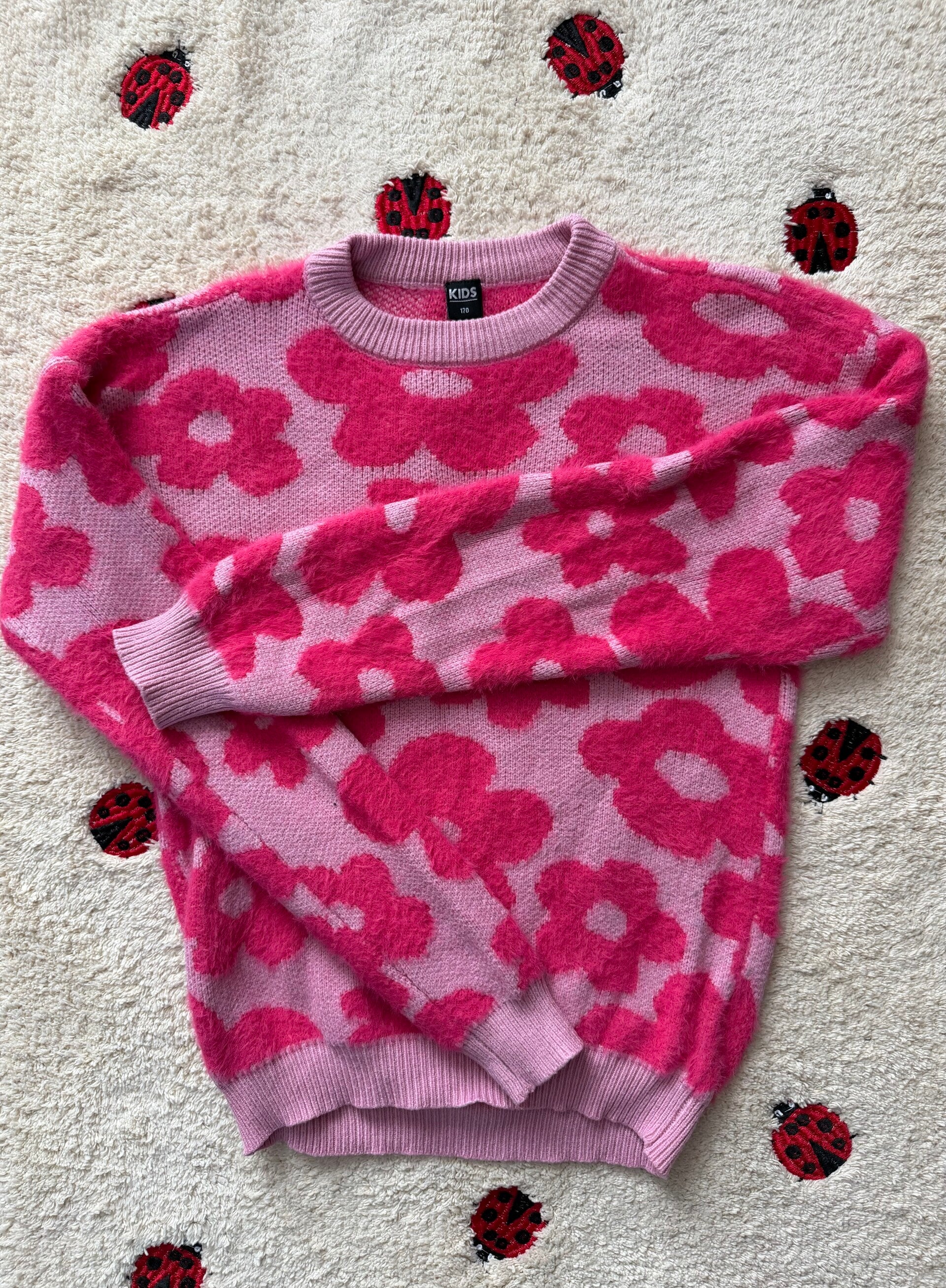 Bloemen trui maat 170