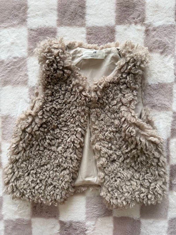 H&M bodywarmer maat 122/128
