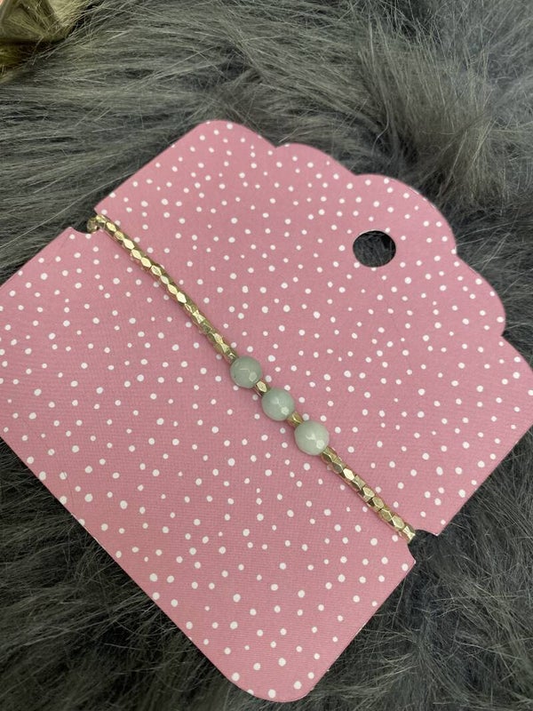 Armbandje goudkleurig / groen