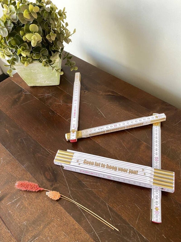 Duimstok met tekst / Vouwmeter met tekst gegraveerd