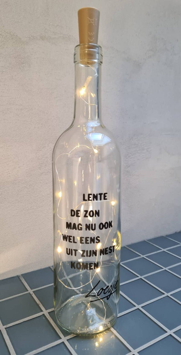 Lichtfles met tekst Lente