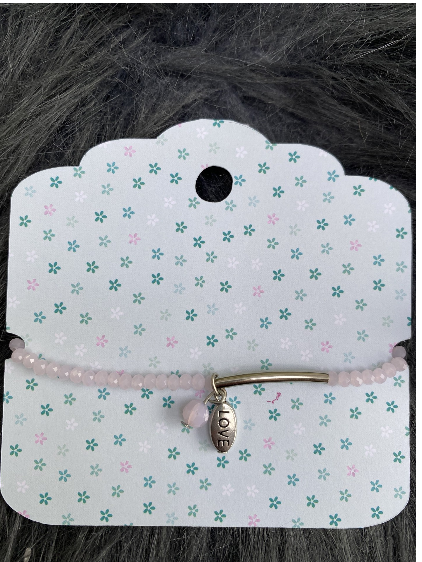 Armbandje licht rose