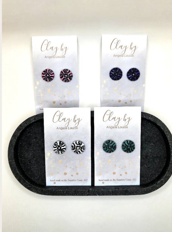 Round- Geometric swirl- RRP $10.95ea