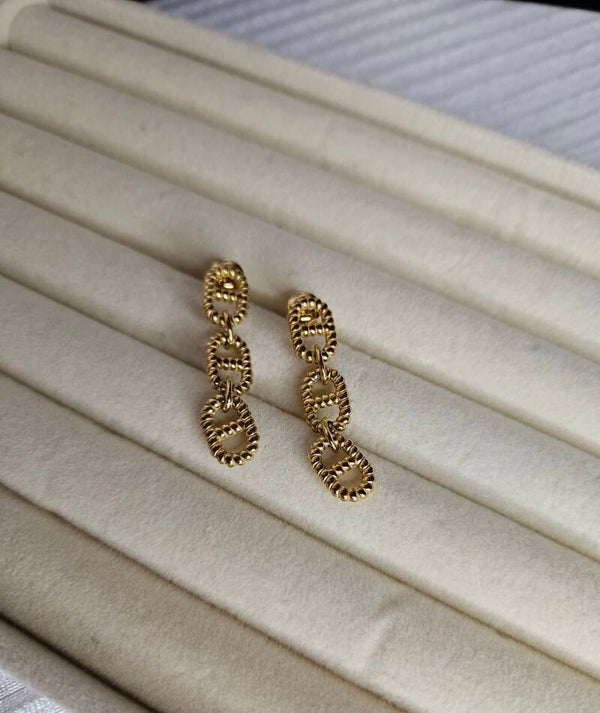 BOUCLE D'OREILLE Martelé