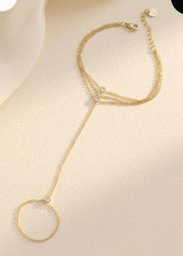 Bracelet fin trèfle et maillons dorés en acier inoxydable