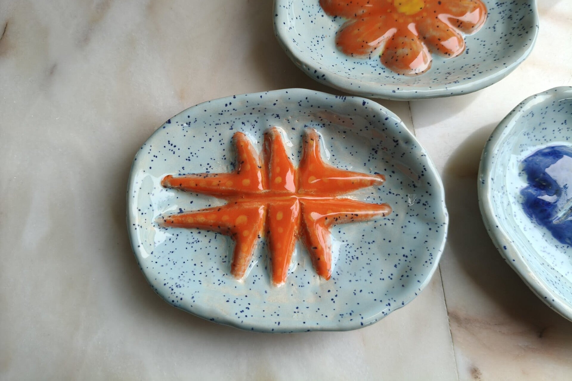 Zeepbakje of ringenschaaltje (oranje ster)