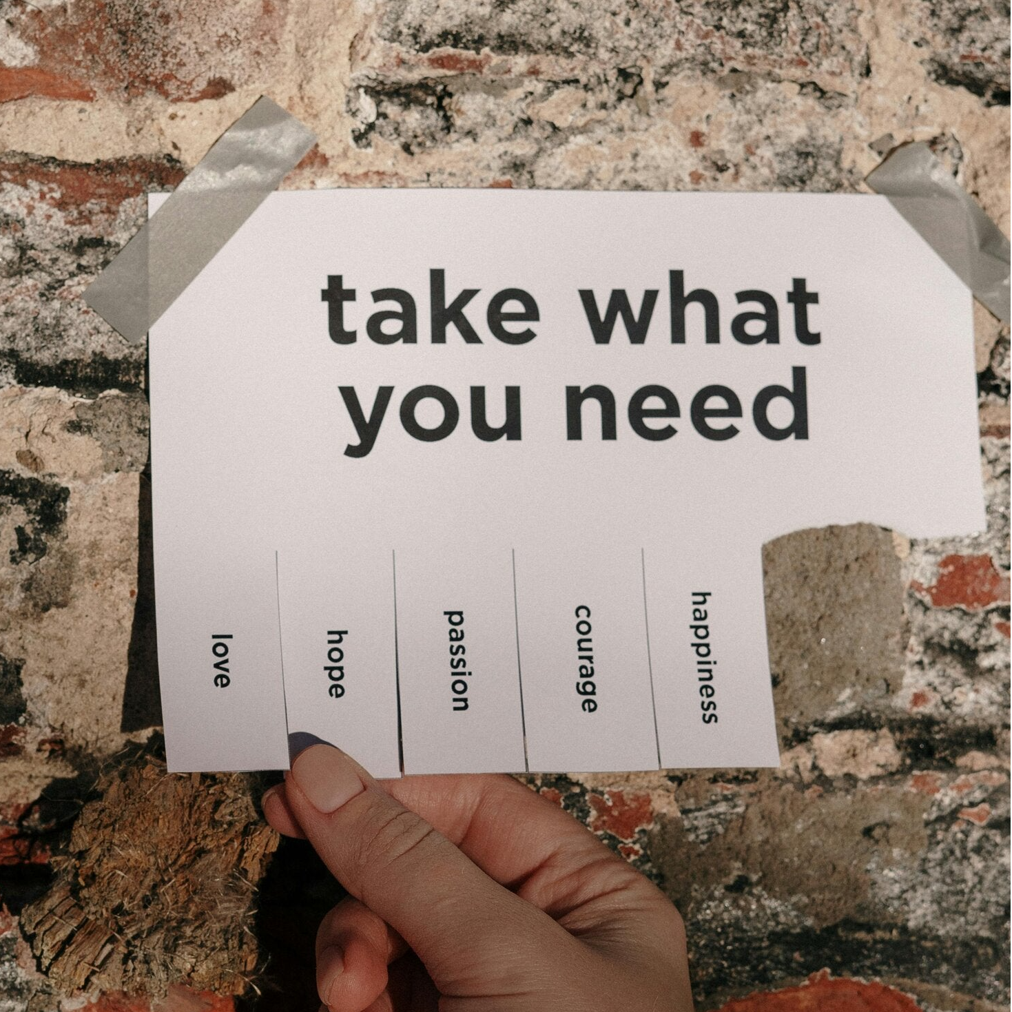 Memo met afscheurbare teksten: love, hope,passion, courage, happiness