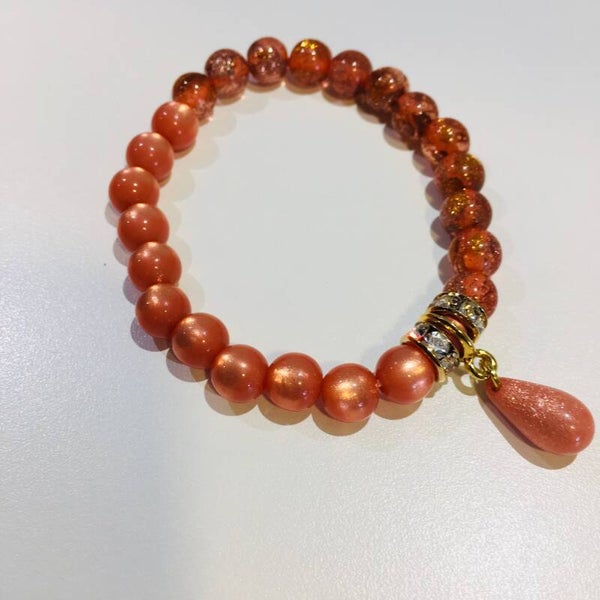 Trendy armband polaris zalmroos