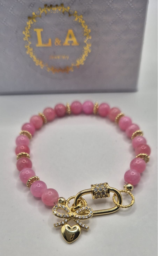 Roze kralen armband met karabijnsluiting