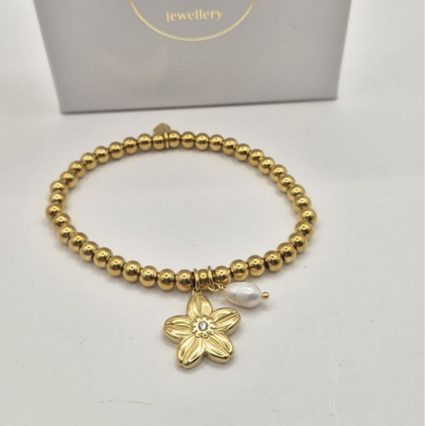 Gouden kralen armband met bloem