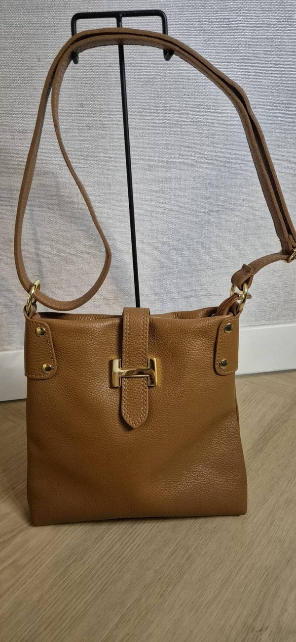 Bruine tas met gouden details