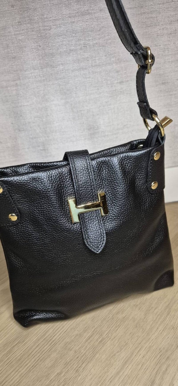 Zwarte tas met gouden details