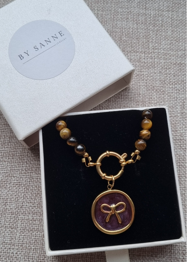 Statement ketting met strik en tijgeroog, bruin.