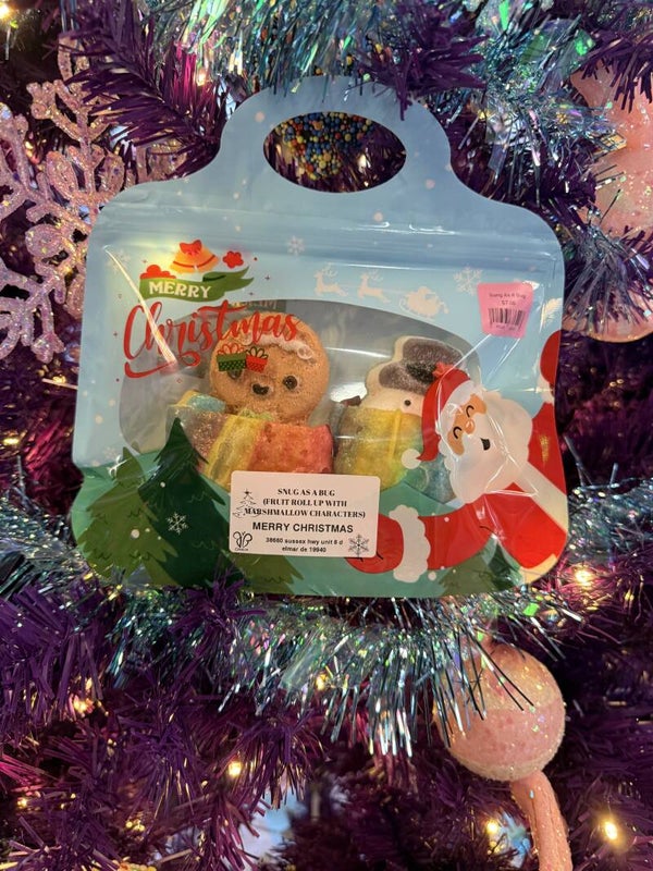 Freeze dried fruit roll ups wrapped around christmas marshmallow