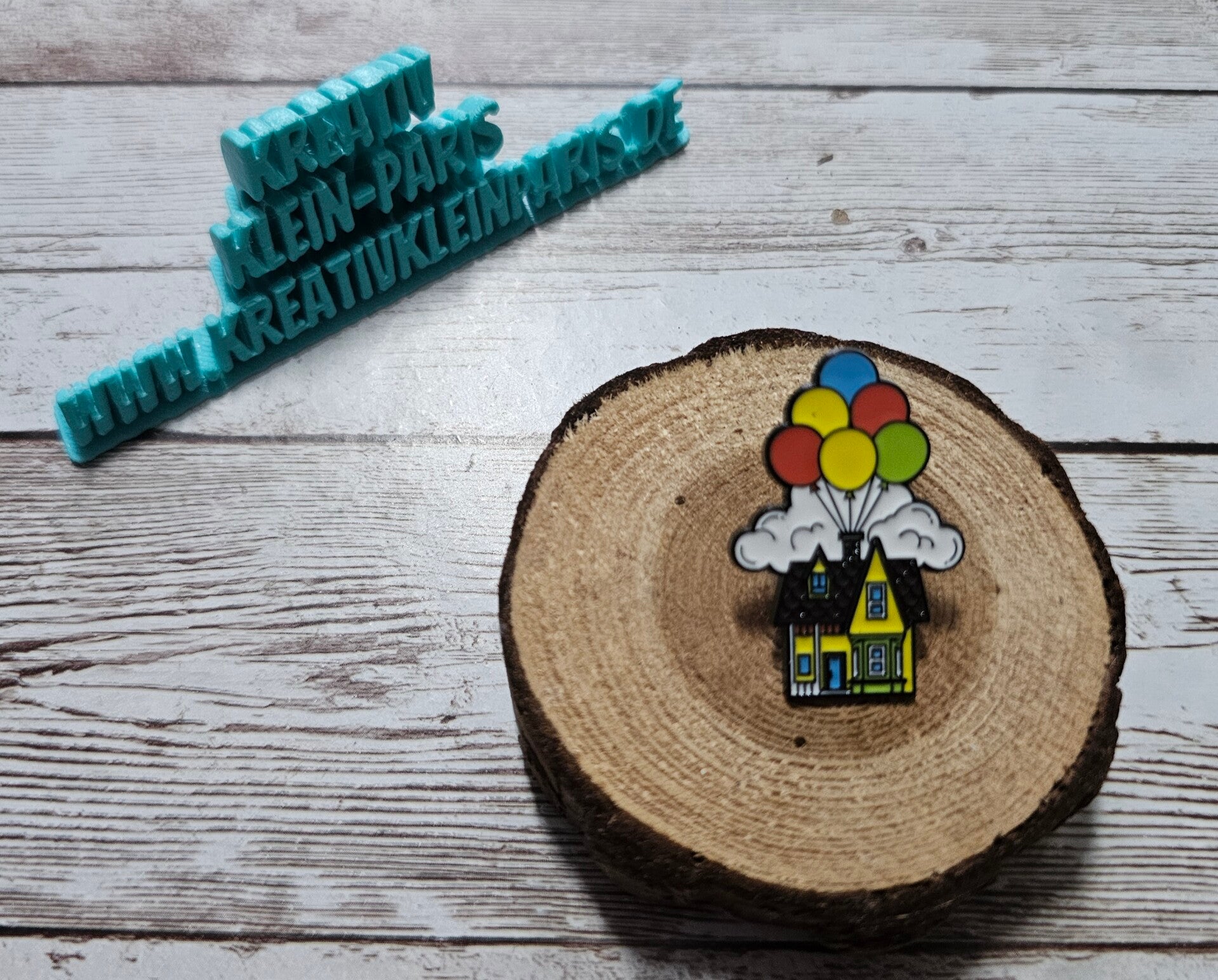 Ansteckpin Luftballonhaus