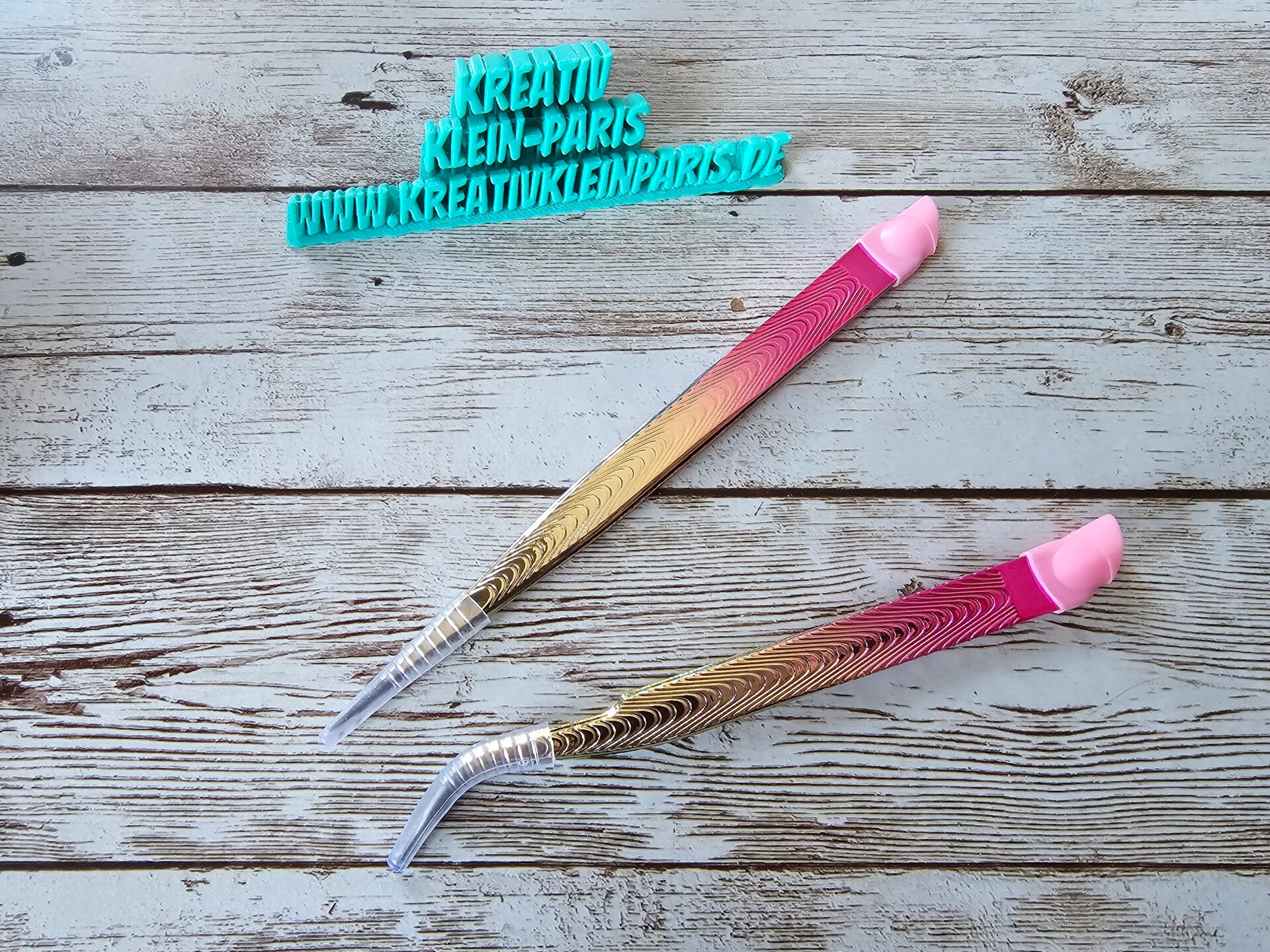 gold-pinke Pinzette mit Schieber