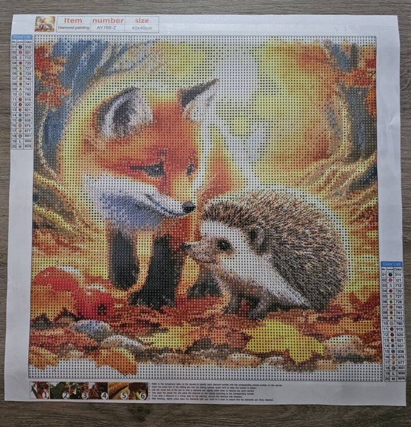 DP Bild Fuchs & Igel im Herbstlaub