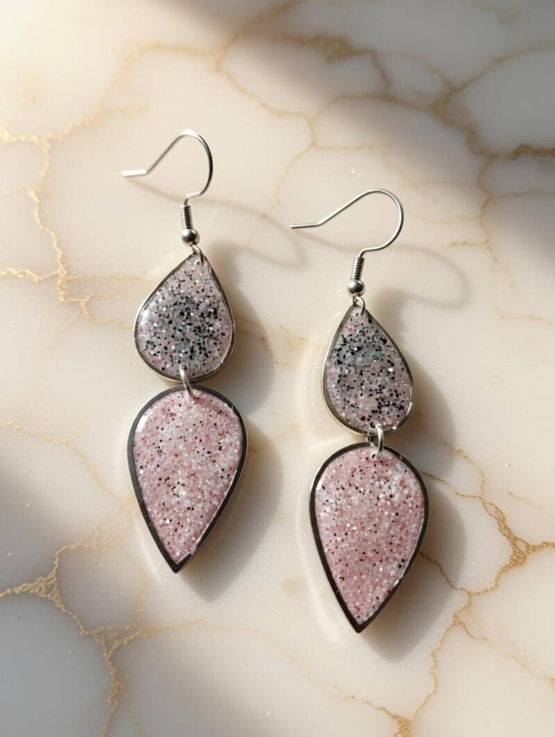 Tropfenform rosa/schwarz Glitter 