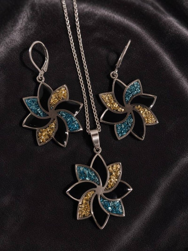 Midnight Pinwheel – Florales Schmuckset aus Edelstahl & Kunstharz