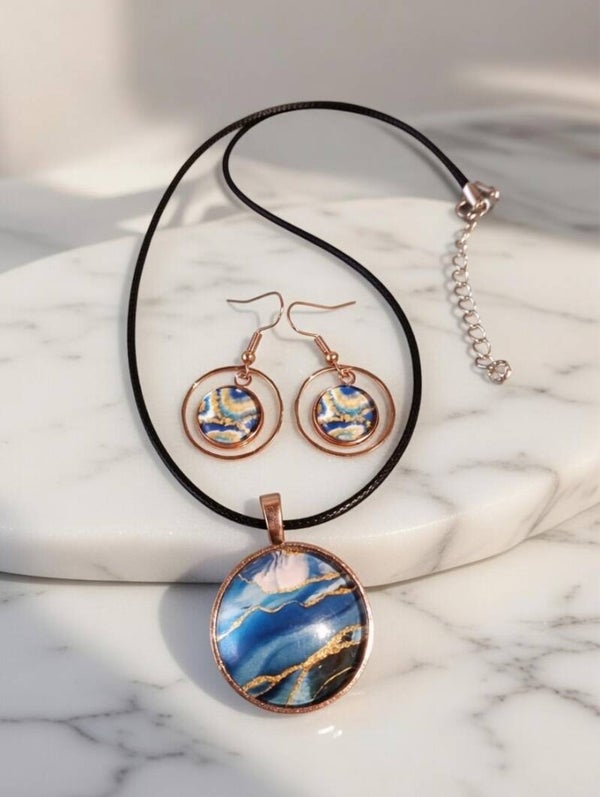 Schmuckset „Deep Ocean“ in Roségold – 25mm Anhänger & 12mm Ohrringe