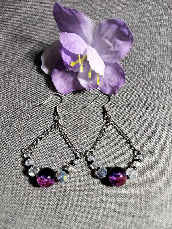 Auffallende Ohrringe mit Glasperlen