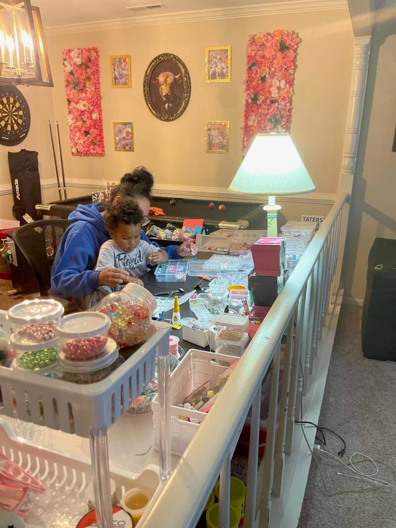 My granddaughter learning the family business