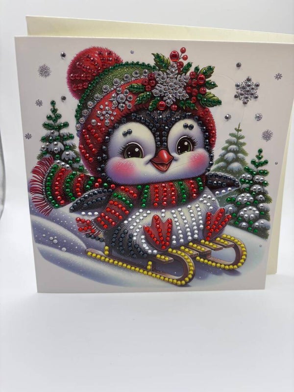 Noël (pingouin sur luge)