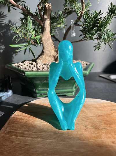 Statue penseur turquoise