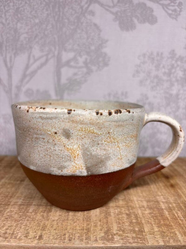Tasse *rousse et blanche*