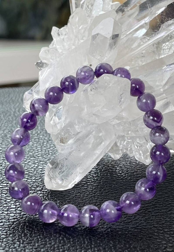 Amethist armband met ronde kralen en elastiek 7,8mm