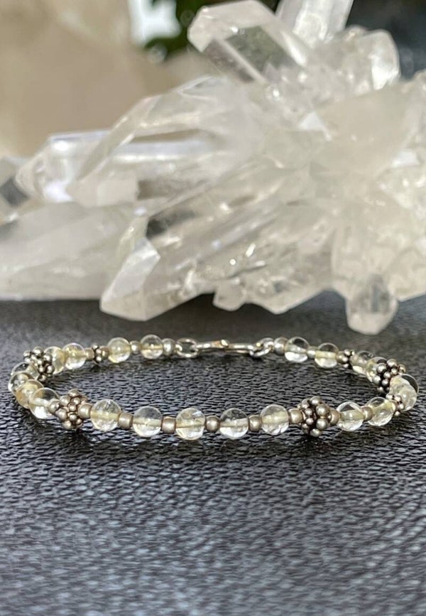 Bergkristal armband met ronde cabochon kralen 4,5mm