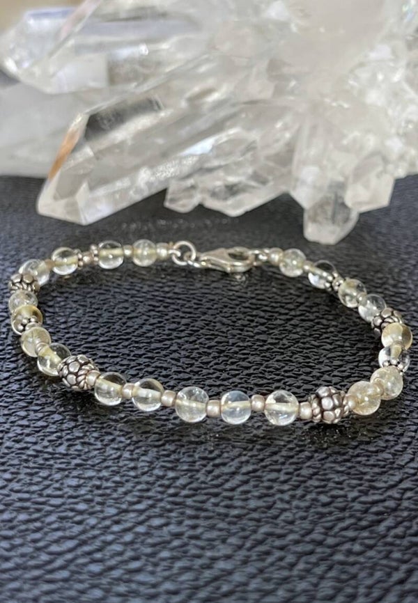 Bergkristal armband met ronde cabochon kralen 4,9mm