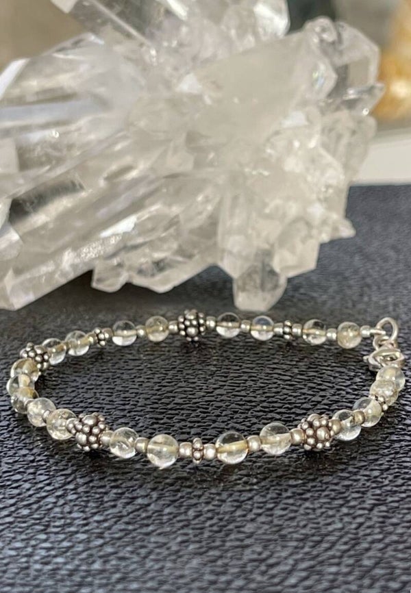 Bergkristal armband met ronde cabochon kralen 4,4mm