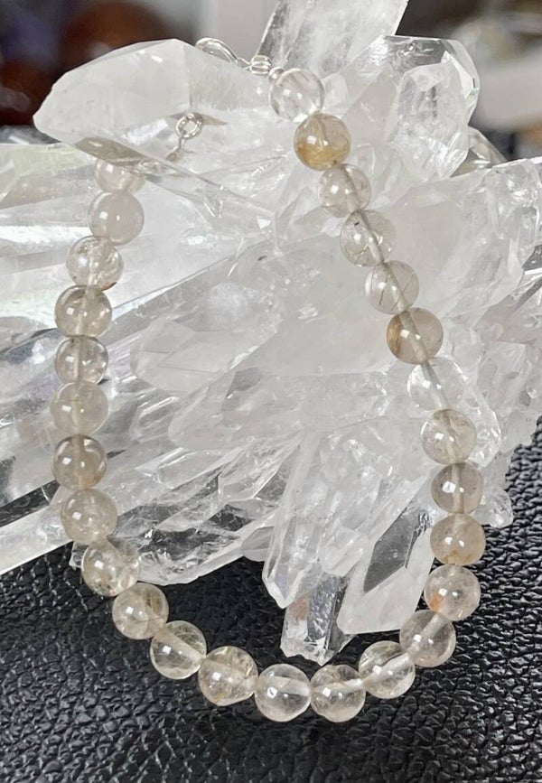 Gouden Rutielkwarts armband met ronde cabochon kralen 6,7mm